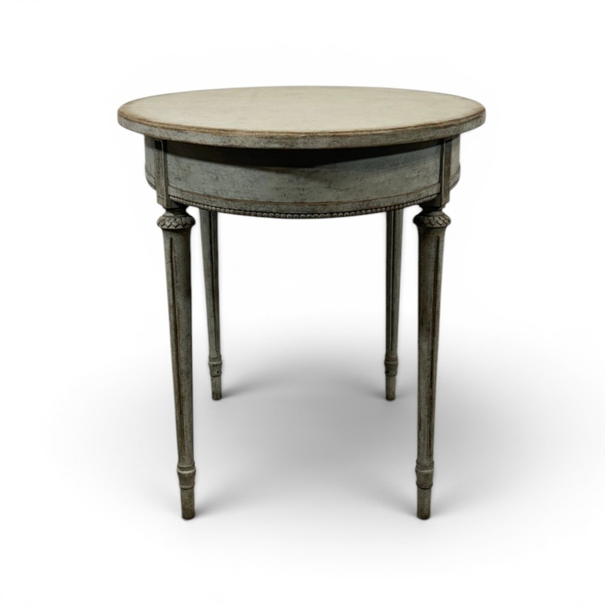 Oval table in the Gustavian style is finished in grey. - JAA