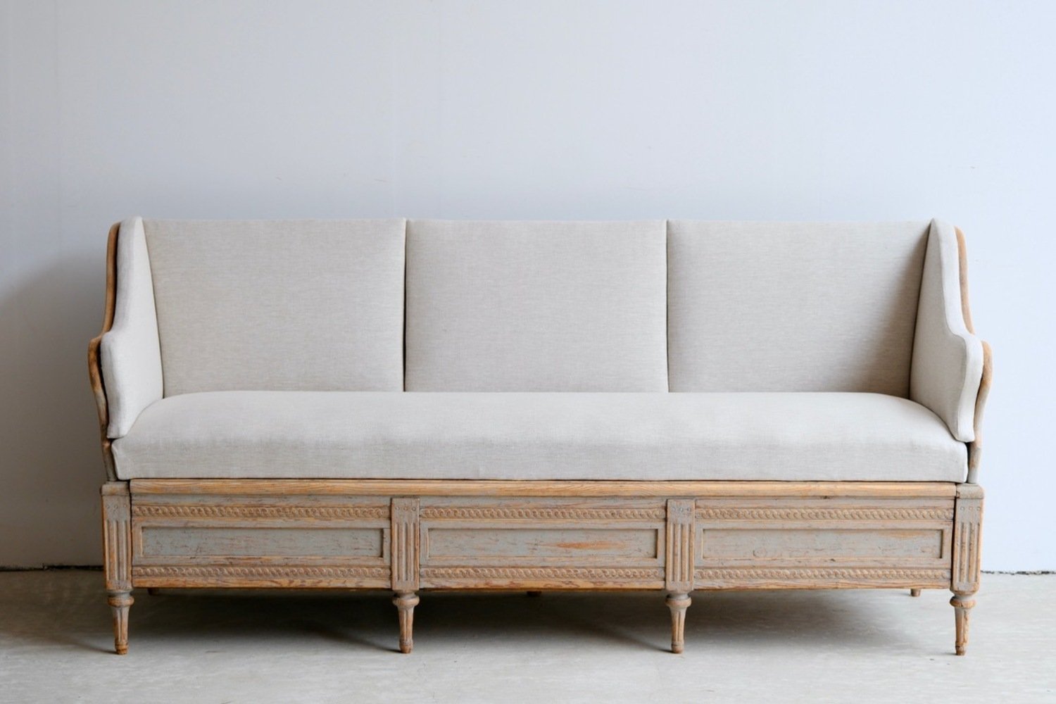 A period Gustavian sofa, repainted in soft blue and newly covered in linen. Circa 1780 - JAA