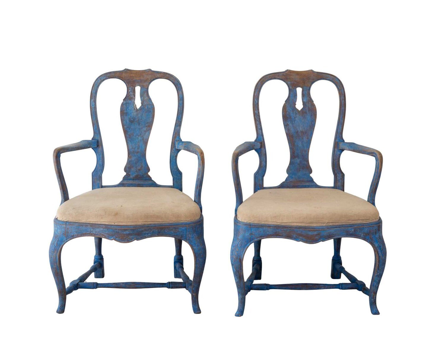 A beautiful pair of antique Swedish Rococo armchairs.
