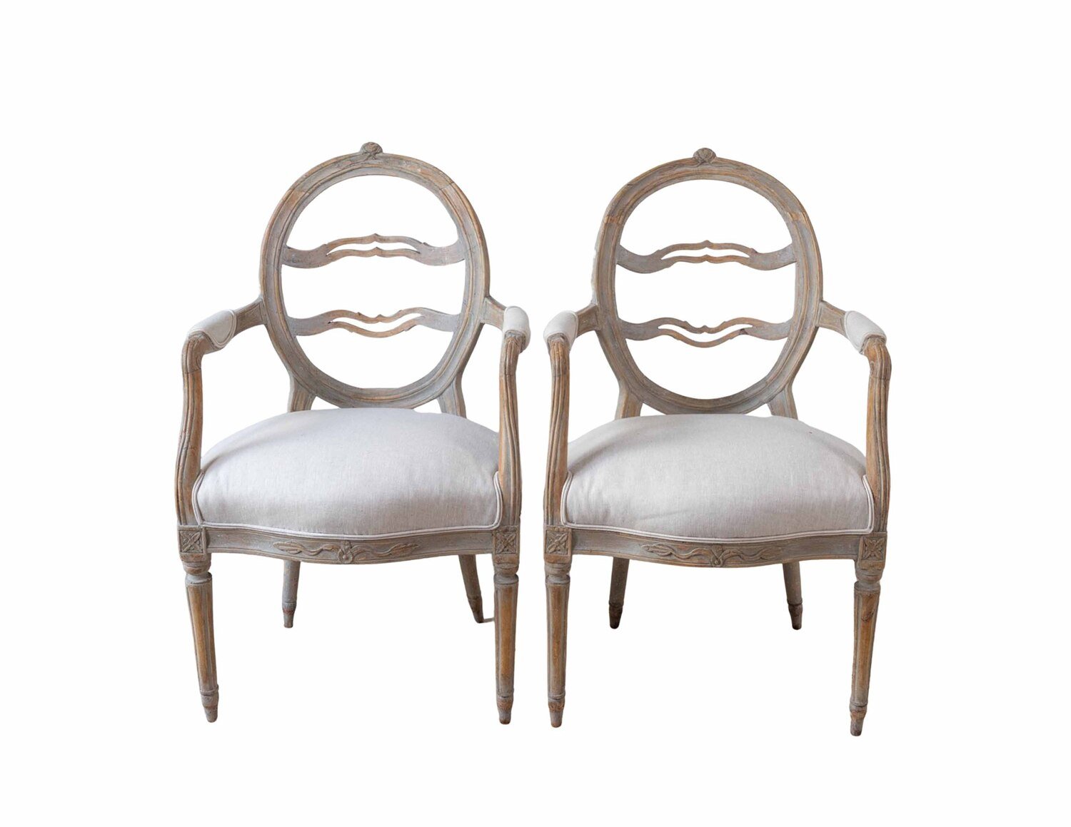 A pair of Gustavian smiling chairs