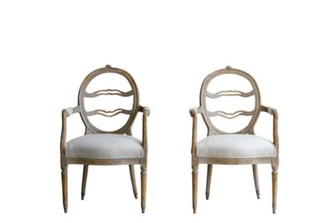 A pair of Gustavian smiling chairs