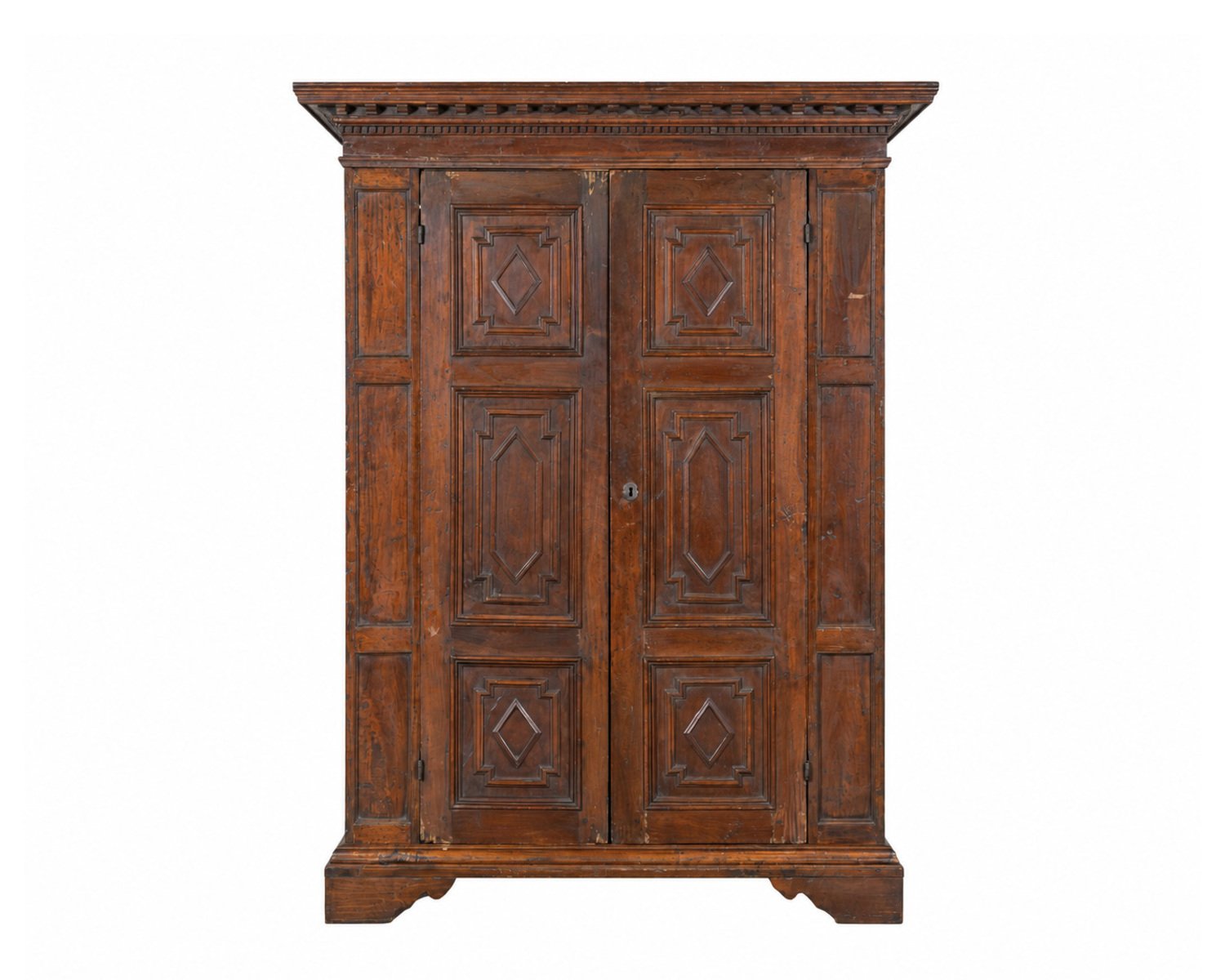 Italian 17th Century Lombard Walnut Wardrobe with Carved Pilasters, Molded Panels and Bracket Feet
