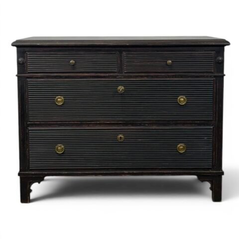 A Swedish chest of drawers with 4 drawers in black.